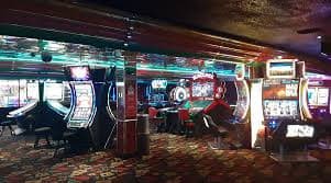 Live casino dealer hosting a real-time table game on aaajili platform